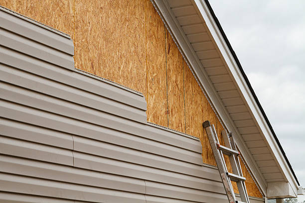 Professional Siding Contractor technician working in Corinth, TX